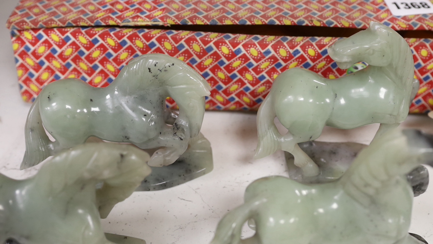 A set of eight Chinese hardstone figures of the horses of Mu Wang